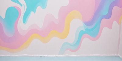The primary subject of the image is a colorful painting or drawing of a wave. The setting is a white wall, and the visual style appears to be a combination of digital art and illustration. The dominant colors in the painting are blue, yellow, and pink, creating a vibrant and lively atmosphere.