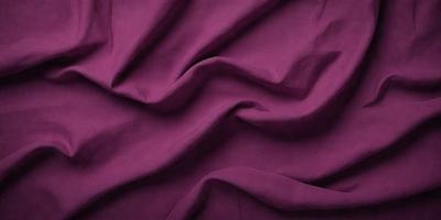 The primary subject of the image is a purple fabric, which is the main object, scene, or focus of the image. The setting or background is a purple cloth, and the visual style is a photo. The colors and mood of the image are predominantly purple, creating a calm and soothing atmosphere.