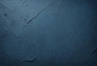 The primary subject of the image is a blue wall with a cracked and chipped appearance. The setting is a room with a blue background. The visual style is a close-up of the blue wall, showcasing its texture and imperfections. The colors and mood of the image are predominantly blue, creating a calm and serene atmosphere.