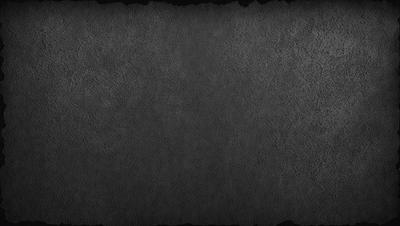 The primary subject of the image is a gray wall with a rough texture. The setting is a room with a gray background. The visual style is a close-up of the gray wall, which gives it a textured appearance. The colors and mood of the image are predominantly gray, creating a calm and neutral atmosphere.