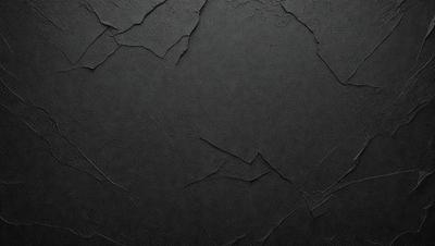 The primary subject of the image is a black leather surface with a rough texture. The setting is a black background, which creates a dramatic and moody atmosphere. The visual style is a close-up of the leather surface, emphasizing its texture and details. The colors are predominantly black, which adds to the dark and intense mood of the image.