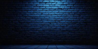 The primary subject of the image is a brick wall with a blue light shining on it. The setting is a dark room, and the visual style appears to be a photo. The dominant colors are blue and black, creating a moody atmosphere.