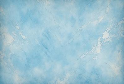 The primary subject of the image is a blue and white marble wall. The setting is a room with a blue and white marble wall as the main focus. The visual style is a photo of the marble wall. The dominant colors are blue and white, creating a calm and serene atmosphere.