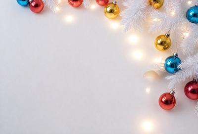 The primary subject of the image is a white background with a string of Christmas lights and ornaments. The lights are shining brightly, creating a festive atmosphere. The setting is indoors, likely during the holiday season. The visual style is a combination of digital art and illustration, as the lights and ornaments are depicted in a realistic manner. The colors and mood are predominantly white and festive, with the lights adding a touch of warmth and joy to the scene.