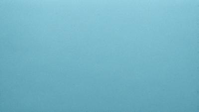 The primary subject of the image is a large, empty, and dark blue sky. The setting is a vast, open space with no visible landmarks or objects. The visual style is a natural, outdoor scene with a focus on the sky. The colors and mood are predominantly dark and moody, with the blue sky creating a sense of vastness and emptiness.