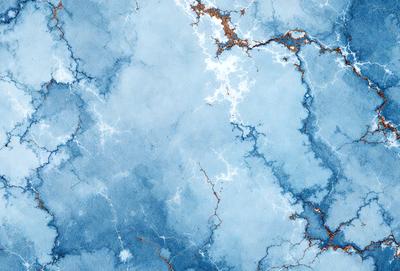 The primary subject of the image is a blue and white marbled wallpaper. The setting is a blue and white marbled wall, which serves as the background. The visual style is a digital art, as the image is a digital representation of the marbled wallpaper. The dominant colors are blue and white, creating a calm and soothing atmosphere.