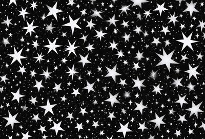 The primary subject of the image is a black and white star pattern. The setting is a black background, and the visual style is a pattern or texture. The dominant colors are black and white, creating a classic and timeless atmosphere.