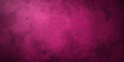 The primary subject of the image is a pink wall with a purple tint. The setting is a room with a pink wall, and the visual style is a close-up of the wall. The colors and mood of the image are predominantly pink and purple, creating a warm and inviting atmosphere.
