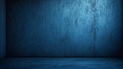 The primary subject of the image is a blue wall with a textured surface. The setting is a room with a blue wall, and the visual style is a photo. The dominant colors are blue and gray, creating a calm and serene atmosphere.