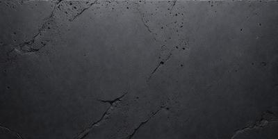 The primary subject of the image is a black surface, possibly a wall or a piece of artwork. The setting is a dark room, and the visual style appears to be a close-up of the black surface. The colors and mood of the image are predominantly dark and moody, with the black surface being the main focus.