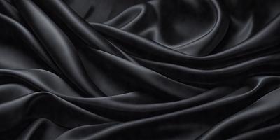 The primary subject of the image is a black fabric, which is the main object, scene, or focus of the image. The setting or background is a black background, which provides a contrasting and dramatic effect. The visual style of the image is a close-up of the black fabric, showcasing its texture and details. The colors and mood of the image are predominantly black, creating a moody and dramatic atmosphere.