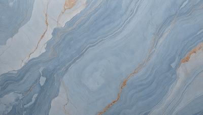 The primary subject of the image is a marble countertop with a blue and white pattern. The setting is a kitchen, and the visual style is a photo. The dominant colors are blue and white, creating a calm and elegant atmosphere.