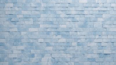 The primary subject of the image is a blue marble wall with a pattern of blue and white tiles. The setting is a room with a blue marble wall as the main focus. The visual style is a close-up of the blue marble wall, showcasing the intricate pattern of the tiles. The colors and mood of the image are predominantly blue and white, creating a calm and elegant atmosphere.