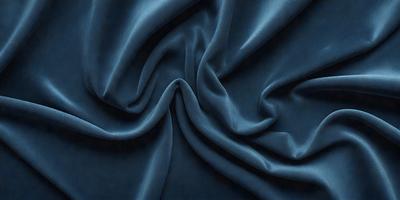 The primary subject of the image is a blue fabric, which is the main object, scene, or focus of the image. The setting or background is a dark blue cloth, and the visual style is a photo. The dominant colors and overall atmosphere are dark blue and blue, creating a calm and serene mood.