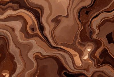 The primary subject of the image is a close-up of a brown and tan marbled stone. The setting is a natural environment, with the stone being the main object of focus. The visual style is a close-up of the stone, showcasing its unique texture and pattern. The colors and mood of the image are warm and earthy, with the brown and tan tones creating a natural and organic atmosphere.