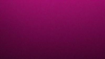 The primary subject of the image is a purple background. The setting is a dark, pinkish background that contrasts with the purple. The visual style is a close-up of the purple background, which gives a sense of depth and texture. The colors and mood of the image are predominantly purple, creating a calm and serene atmosphere.