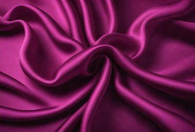 The primary subject of the image is a purple fabric, which is the main object, scene, or focus of the image. The setting or background is a purple fabric, and the visual style is a photo. The colors and mood of the image are predominantly purple, creating a calm and soothing atmosphere.