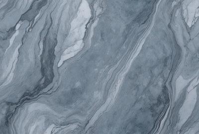 The primary subject of the image is a marble-like surface with a pattern of swirls and waves. The setting is a gray and white marble-like surface, which gives the image a natural and elegant appearance. The visual style is a close-up of the marble surface, showcasing its intricate patterns. The colors and mood of the image are predominantly gray and white, creating a calm and sophisticated atmosphere.