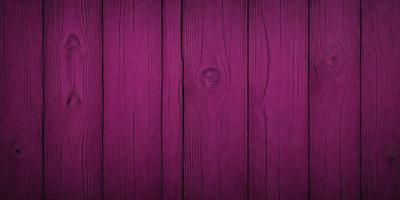 The primary subject of the image is a wooden wall with a purple color. The setting is a room with a wooden surface, and the visual style is a close-up of the wooden wall. The dominant colors are purple and brown, creating a warm and cozy atmosphere.
