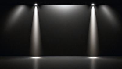 The primary subject of the image is a black background with three bright white spotlights shining on it. The setting is a dark room, and the visual style is a black and white photo. The colors and mood of the image are dramatic and intense, as the spotlights create a stark contrast against the darkness of the background.