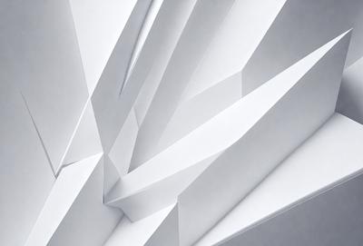 The primary subject of the image is a white paper, which is the main object, scene, or focus of the image. The setting is a white background, and the visual style is a photo. The colors and mood of the image are predominantly white, giving it a clean and minimalist appearance.