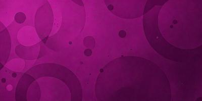 The primary subject of the image is a purple background with a pattern of circles. The setting is a wall, and the visual style is a patterned background. The dominant colors are purple and white, creating a calm and soothing atmosphere.