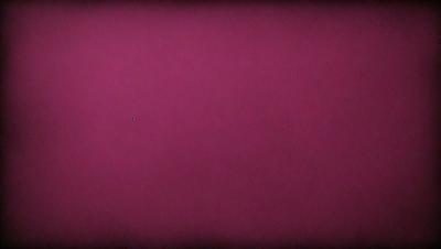 The primary subject of the image is a pink background. The setting is a large, empty space with no visible objects or people. The visual style is a close-up of the pink background, which gives the image a simple and minimalistic appearance. The colors and mood of the image are predominantly pink, creating a warm and inviting atmosphere.
