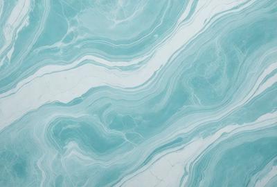 The primary subject of the image is a blue and white marble tile. The setting is a bathroom, as the tile is placed on a bathroom counter. The visual style is a close-up of the tile, showcasing its intricate design. The dominant colors are blue and white, creating a clean and elegant atmosphere.