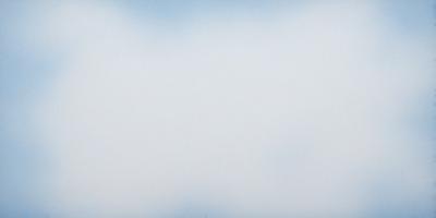 The primary subject of the image is a cloudy sky. The setting is a vast, open space with no visible landmarks or objects. The visual style is a photo, capturing the natural beauty of the cloudy sky. The colors and mood of the image are predominantly blue and gray, creating a serene and peaceful atmosphere.