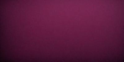 The primary subject of the image is a large, purple wall. The setting is a room with a purple background, which creates a unique and striking visual effect. The visual style of the image is a close-up of the purple wall, emphasizing its color and texture. The dominant colors in the image are purple and red, giving the scene a bold and vibrant atmosphere.