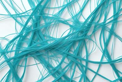 The primary subject of the image is a close-up of a blue, twisted, and tangled piece of yarn. The setting is a white background, which provides a clean and uncluttered environment for the yarn to be the main focus. The visual style is a close-up of the yarn, showcasing its intricate twists and turns. The colors and mood of the image are predominantly blue, creating a sense of calmness and tranquility.
