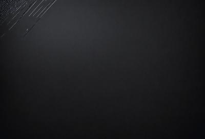 The primary subject of the image is a black background with a white wire. The setting is a dark room, and the visual style is a close-up of the wire. The colors are predominantly black and white, creating a stark and minimalist atmosphere.