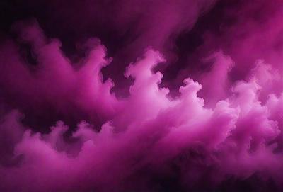 The primary subject of the image is a purple cloud with a pink hue. The cloud is surrounded by a purple sky, creating a visually striking scene. The setting appears to be a space with a backdrop of a purple and pink cloud. The visual style of the image is a combination of digital art and illustration, giving it a unique and artistic appearance. The dominant colors in the image are purple and pink, creating a calming and serene atmosphere.