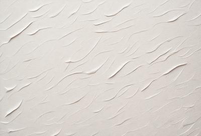 The image features a white wall with a pattern of swirls and waves. The wall appears to be made of a material that resembles a canvas or a textured surface. The swirls and waves create a visually interesting and dynamic pattern that adds depth and texture to the wall. The overall atmosphere of the image is clean, minimalistic, and artistic.