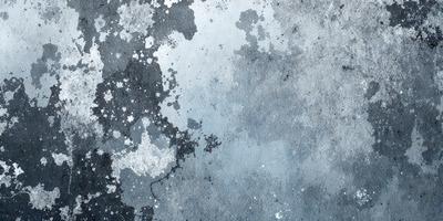 The primary subject of the image is a large, textured wall with a blue background. The setting appears to be an industrial or urban environment. The visual style of the image is a combination of photo and digital art, creating a unique and intriguing appearance. The dominant colors in the image are blue and gray, giving the scene a calm and moody atmosphere.