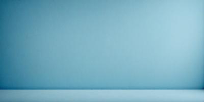The primary subject of the image is a blue wall. The setting is a room with a blue background. The visual style is a photo, and the colors and mood are predominantly blue, creating a calm and serene atmosphere.