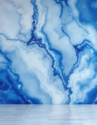 The primary subject of the image is a blue marble wall with a pattern of swirls and waves. The setting is a room with a wooden floor. The visual style is a close-up of the marble wall, showcasing its intricate design. The dominant colors are blue and white, creating a serene and elegant atmosphere.
