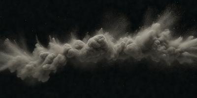 The primary subject of the image is a cloud of dust or smoke, which appears to be a black and white photo. The setting is a dark background, and the visual style is a close-up of the cloud. The colors and mood of the image are predominantly dark and moody, with the cloud being the main focus of the scene.