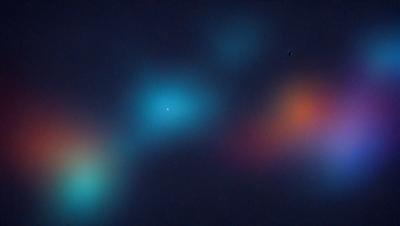 The primary subject of the image is a blue and green nebula, which is a cloud of gas and dust in space. The setting is a dark, starry sky, and the visual style is a combination of a photo and digital art. The dominant colors are blue and green, creating a serene and peaceful atmosphere.