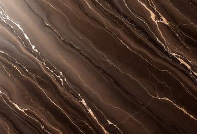 The primary subject of the image is a marble countertop with a brown and white pattern. The setting is a kitchen, and the visual style is a close-up of the marble countertop. The colors and mood of the image are warm and natural, with the brown and white marble creating a sense of elegance and sophistication.