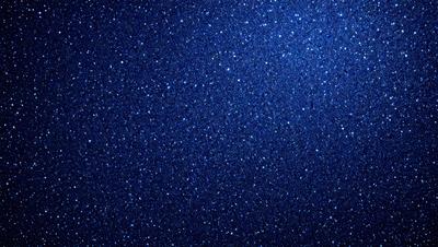 The primary subject of the image is the night sky, which is filled with a multitude of stars. The setting is a dark, star-filled sky, and the visual style is a photo of the night sky. The colors and mood of the image are predominantly dark and serene, with the stars providing a sense of depth and beauty.