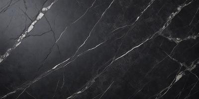 The primary subject of the image is a black marble countertop. The setting is a kitchen, with the countertop being the main focus of the scene. The visual style is a close-up of the marble countertop, showcasing its texture and details. The colors and mood of the image are predominantly dark, with the black marble countertop being the main source of contrast and visual interest.