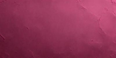 The primary subject of the image is a pink wall. The setting is a room with a pink wall, and the visual style is a photo. The dominant colors are pink, and the overall atmosphere is warm and inviting.