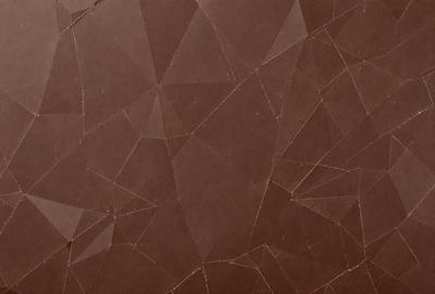 The primary subject of the image is a brown leather surface with a geometric pattern. The setting is a room with a brown wall, and the visual style is a combination of a photo and digital art. The colors and mood of the image are warm and earthy, with a sense of texture and depth.
