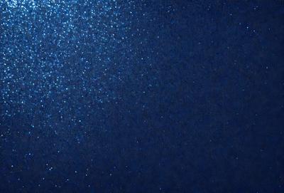 The primary subject of the image is a blue background with a pattern of blue and white stars. The setting is a dark blue sky, and the visual style appears to be a digital art or illustration. The colors and mood of the image are predominantly dark and moody, with the blue and white stars creating a sense of depth and contrast.
