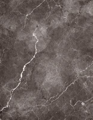The image features a gray marble wall with a crack running through it. The crack appears to be a prominent feature of the wall, and it is surrounded by a gray stone texture. The overall atmosphere of the image is somewhat dark and moody, with the crack in the marble wall serving as a focal point.