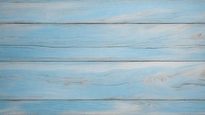 The primary subject of the image is a wooden wall with a blue and white color scheme. The setting is a room with a wooden floor, and the visual style is a close-up of the wooden wall. The colors and mood of the image are predominantly blue and white, creating a calm and serene atmosphere.