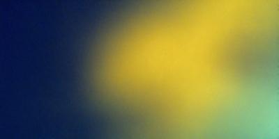 The primary subject of the image is a yellow background. The setting is a dark room, and the visual style appears to be a photo. The dominant colors are yellow and blue, creating a warm and inviting atmosphere.