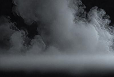The primary subject of the image is a cloudy sky. The setting is a dark, cloudy environment, with the sky being the main focus of the image. The visual style is a black and white photo, which adds a dramatic and moody atmosphere to the scene. The colors and mood of the image are predominantly dark and cloudy, with the cloudy sky being the main subject and the overall atmosphere being somewhat ominous.