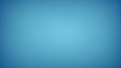 The primary subject of the image is a large, empty blue sky. The setting is a vast, open space with no visible landmarks or objects. The visual style is a simple, clean blue background, which creates a calm and serene atmosphere.